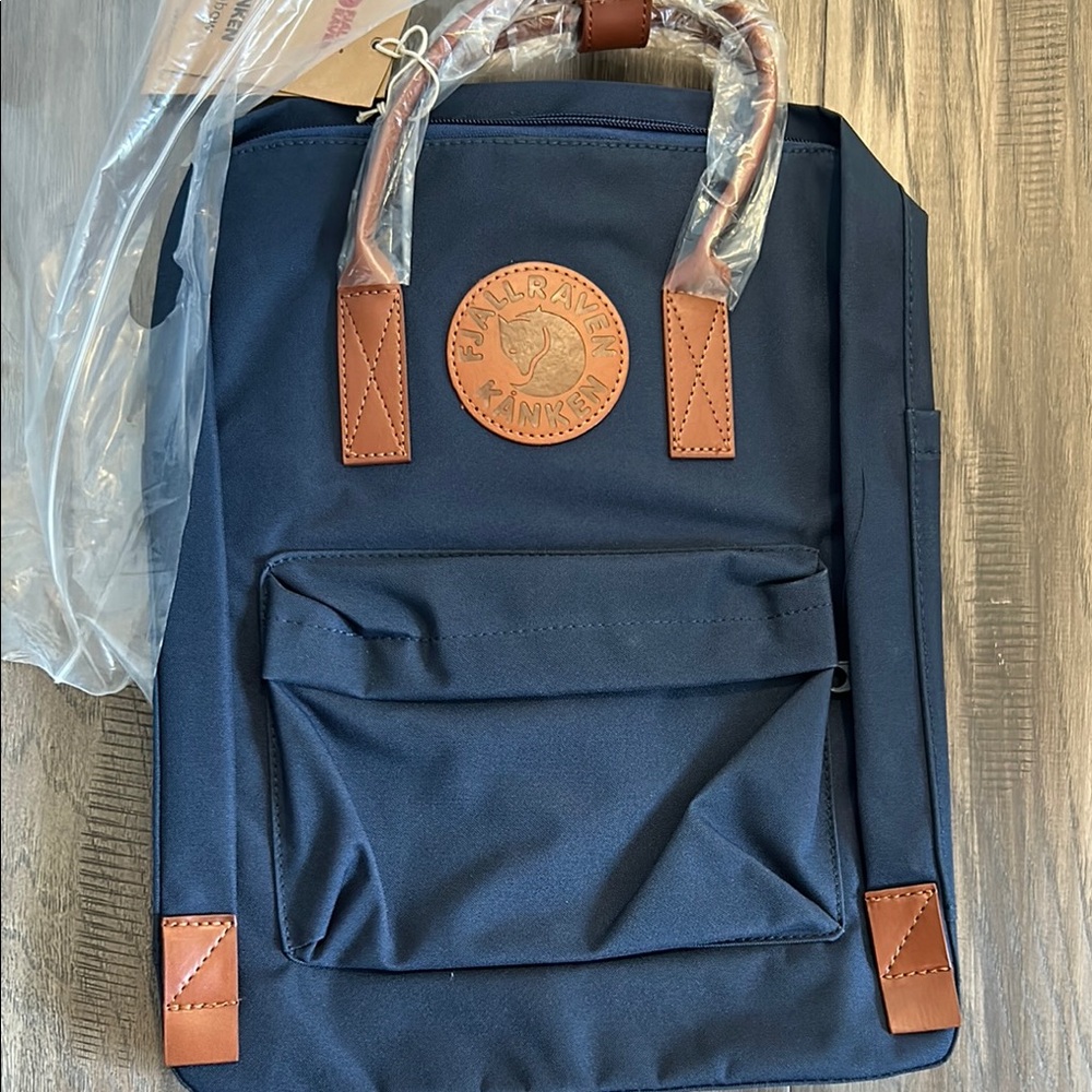 Blue and Brown Backpack with Leather Accents